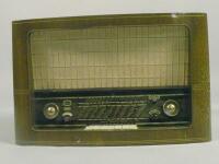 A Braun radio in a walnut case