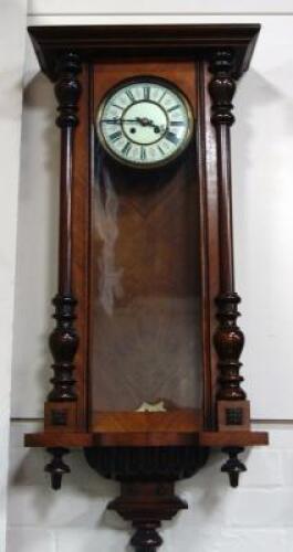 A 19th C Black Forest walnut wall clock