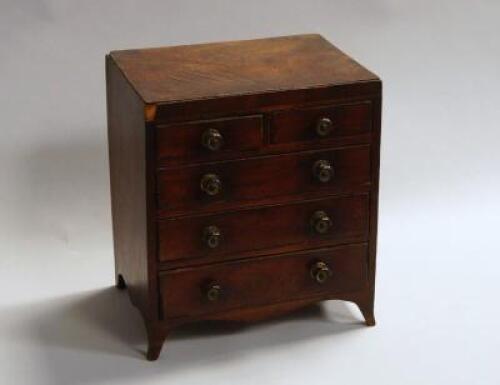 A 19thC flamed mahogany miniature chest of drawers