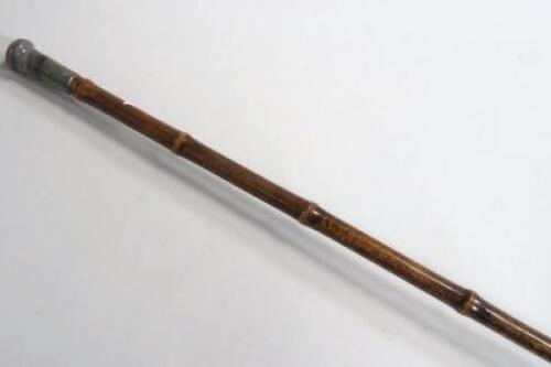 A Victorian bamboo walking cane with bulls eye agate top.