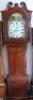 A 19thC flamed mahogany longcase clock