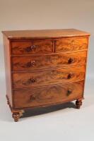 A Victorian flamed mahogany bow front chest