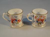 A pair of porcelain tankards