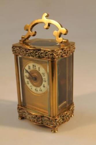 A gilt brass carriage timepiece