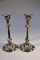 A pair of silver plated candlesticks