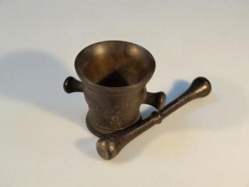 A 19thC bronze pestle and mortar
