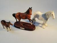 A Royal Doulton animal sculpture 'Spirit of the Wind' and two Beswick models