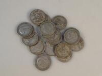 Twenty George V one shilling pieces.