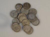 Twenty George V one shilling pieces.