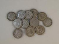 Thirteen George V one shilling pieces.