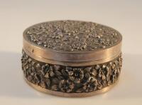 A Chinese white metal circular trinket box