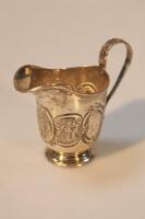 A late Victorian silver cream jug