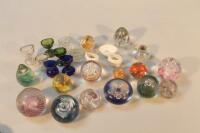 A collection of various abstract paperweights