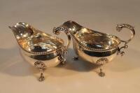 A pair of Edward VII silver sauce boats