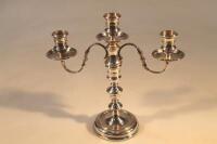 An Elizabeth II silver three light candelabrum