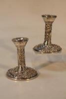 A pair of modern silver boudoir candlesticks