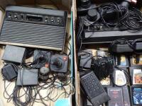 An Atari video game console and various games.