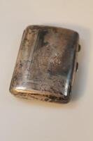 An Edwardian silver cigarette holder