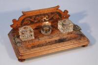 A late Victorian Aesthetic movement oak desk stand