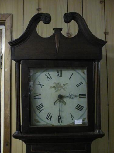 An oak and mahogany crossbanded longcase clock