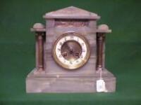 A 19thC. green onyx mantel clock of architectural form