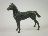 A bronze figure of a standing horse by Stuart Anderson