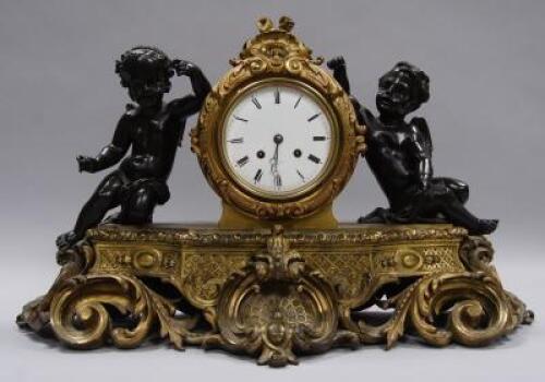 A 19thC French ormolu and bronze mantel clock