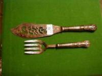A pair of Victorian silver fish servers with pierced blades and tines