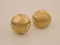 A pair of globe earrings