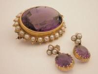 An amethyst and pearl brooch