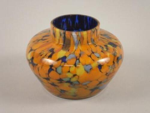 An early 20thC mottled glass vase