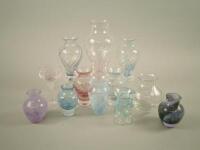 A collection of Caithness type glass vases