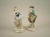 A pair of Dresden porcelain figures of a gentleman and lady