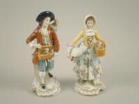 A pair of Dresden porcelain figures