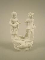 A 19thC German bisque porcelain group of children playing musical instruments