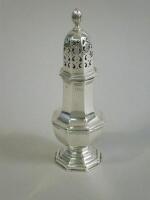 An octagonal silver baluster shaped sugar caster