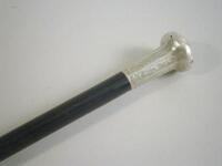 An Edwardian ebonised walking cane