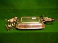 A silver plated entree dish and cover