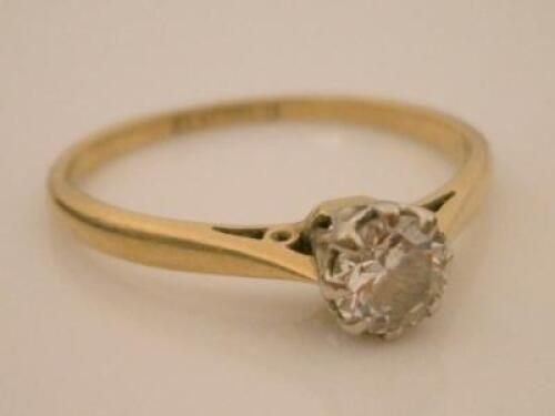 A diamond solitaire ring