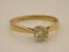 An 18ct gold diamond solitaire ring