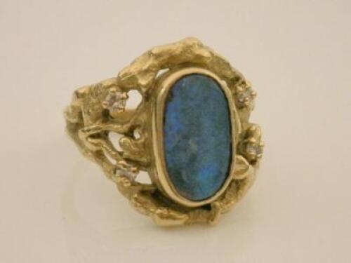 An 18ct gold opal and diamond set abstract ring