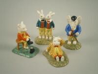 Four Royal Doulton Rupert Bear figures