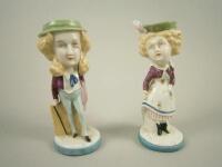 A pair of German porcelain figures