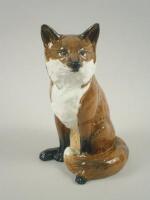 A large Beswick figure of a seated fox