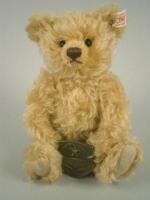 A small modern Steiff teddy bear