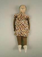 A 19thC wooden and padded doll