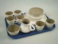 A Poole pottery brown two tone part tea service