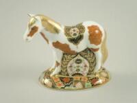 A Royal Crown Derby horse paperweight