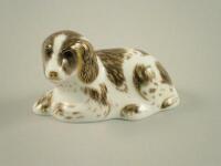 A Royal Crown Derby paperweight of a dog