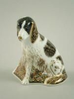 A Royal Crown Derby paperweight of a dog